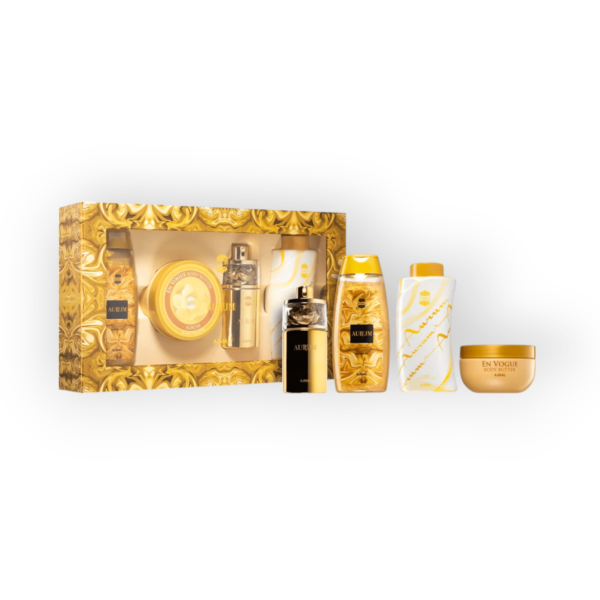 Coffret de parfum pour homme et femme - Aurum - Ajmal  Plongez dans un univers d’élégance et de raffinement avec Aurum by Ajmal, une fragrance florale fruitée aux accents orientaux, conçue pour capturer l’essence du glamour et de l’opulence. Parfait pour les hommes et les femmes en quête d’une signature olfactive lumineuse et sophistiquée, ce coffret exclusif offre une expérience sensorielle complète à travers une routine parfumée harmonieuse. Un Coffret d’Exception pour un Rituel Parfumé Inoubliable Le coffret Aurum comprend quatre essentiels de soin et de parfum pour sublimer la peau tout au long de la journée : Eau de Parfum – 75ml : Une fragrance envoûtante qui mêle fraîcheur fruitée, cœur floral et profondeur boisée. Body Butter – 200g : Un beurre corporel riche et onctueux, infusé de la senteur Aurum pour une peau douce et parfumée. Shower Gel – 200ml : Un gel douche délicatement parfumé qui nettoie en douceur tout en enveloppant la peau d’un voile luxueux. Powder – 100g : Une poudre parfumée raffinée qui laisse la peau subtilement veloutée et délicieusement parfumée. Une Fragrance Rayonnante et Sophistiquée Dès les premières notes, Aurum séduit par une ouverture pétillante et fruitée, où la framboise juteuse rencontre la fraîcheur acidulée du citron, offrant une sensation lumineuse et exaltante. Au cœur de la composition, un bouquet floral exquis s’épanouit : le gardénia velouté, la fleur d’oranger ensoleillée et le jasmin enivrant s’entrelacent avec des notes épicées et fruitées, apportant une profondeur sensuelle et raffinée. Enfin, le fond révèle une chaleur irrésistible, où les notes poudrées et la vanille crémeuse se mêlent à l’ambre, au musc et aux bois précieux, laissant un sillage sophistiqué et captivant. Aurum, une Signature Parfumée Intemporelle Conçu pour ceux et celles qui aiment se distinguer, Aurum est une fragrance qui incarne la confiance en soi, l’élégance et l’éclat. Idéal pour les journées où l’on souhaite rayonner ou pour les soirées où l’on veut laisser une empreinte inoubliable, ce parfum mixte est une célébration du luxe et de la sensualité. Laissez-vous séduire par Aurum by Ajmal, une collection qui transforme chaque instant en un rituel de beauté et de raffinement. Notes Olfactives Famille Olfactive : Floral, Fruité, Oriental Notes de Tête : Framboise, Citron Notes de Cœur : Notes fruitées, Gardénia, Fleur d'oranger, Jasmin, Notes épicées Notes de Fond : Notes poudrées, Vanille, Ambre, Musc, Notes boisées